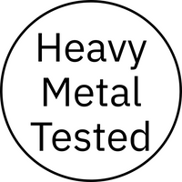 Circular logo with 'Heavy Metal Tested' text inside a black circle on a white background
